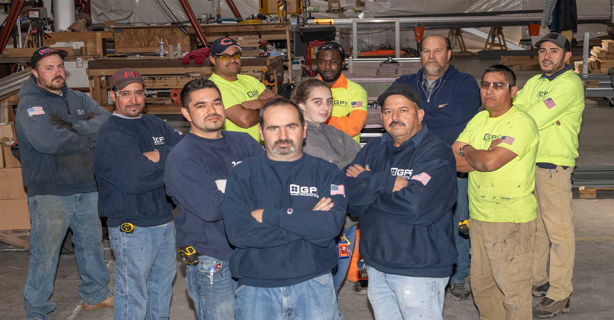 Construction team posing in warehouse
